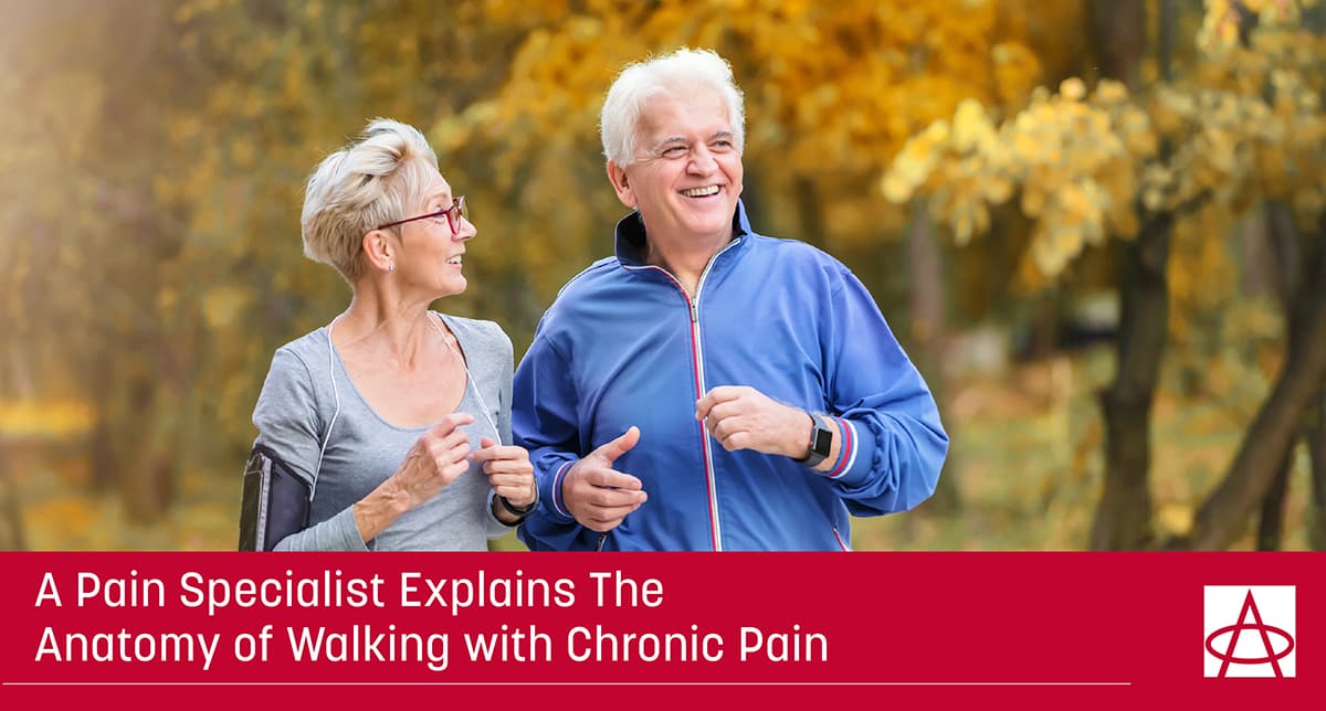 header image for article where A man and his wife go walking in the park to reduce their chronic pain as recommended by a pain specialist a caption reads A Pain Specialist Explains The Anatomy of Walking with Chronic Pain