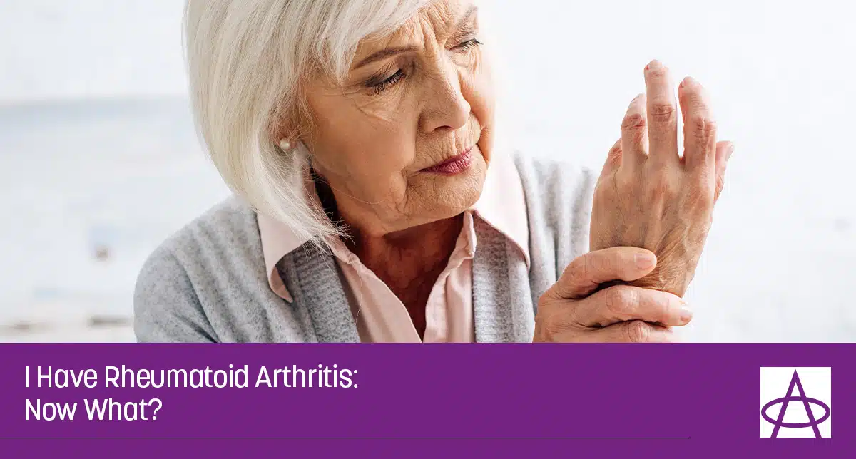 Woman holding her hand